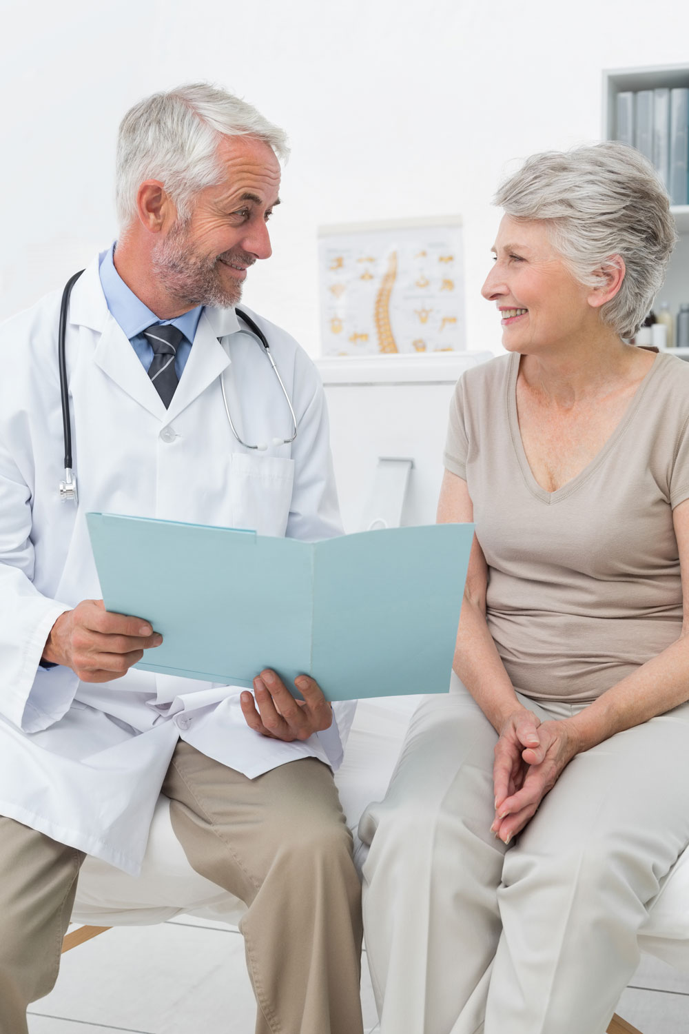 Doctor reviewing medical history with patient during a memory evaluation